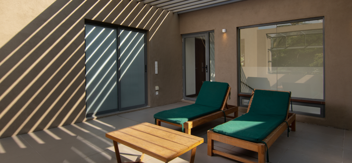 Sunrise Ridge Villa Balcony with sunbeds