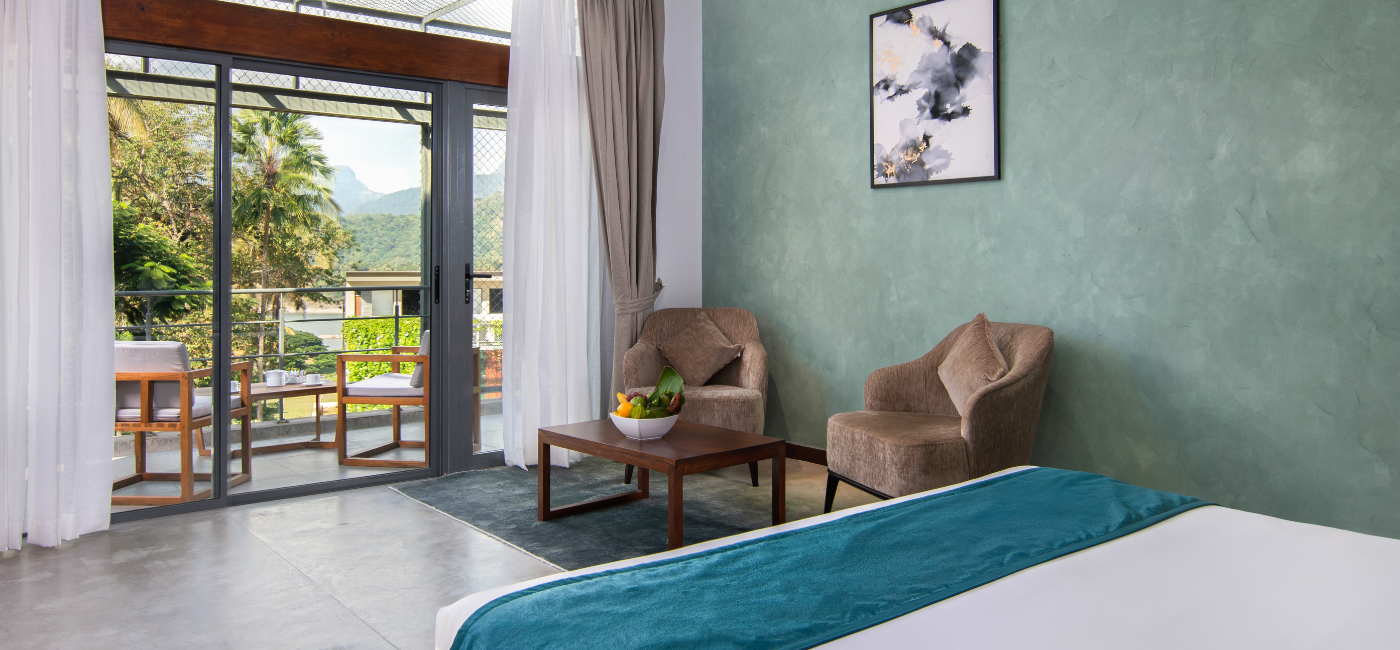 Sunrise Ridge Villa Room with balcony view and sitting sofa